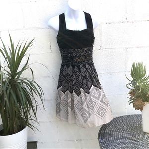 Bebe size medium silk with jeweled waistline dress